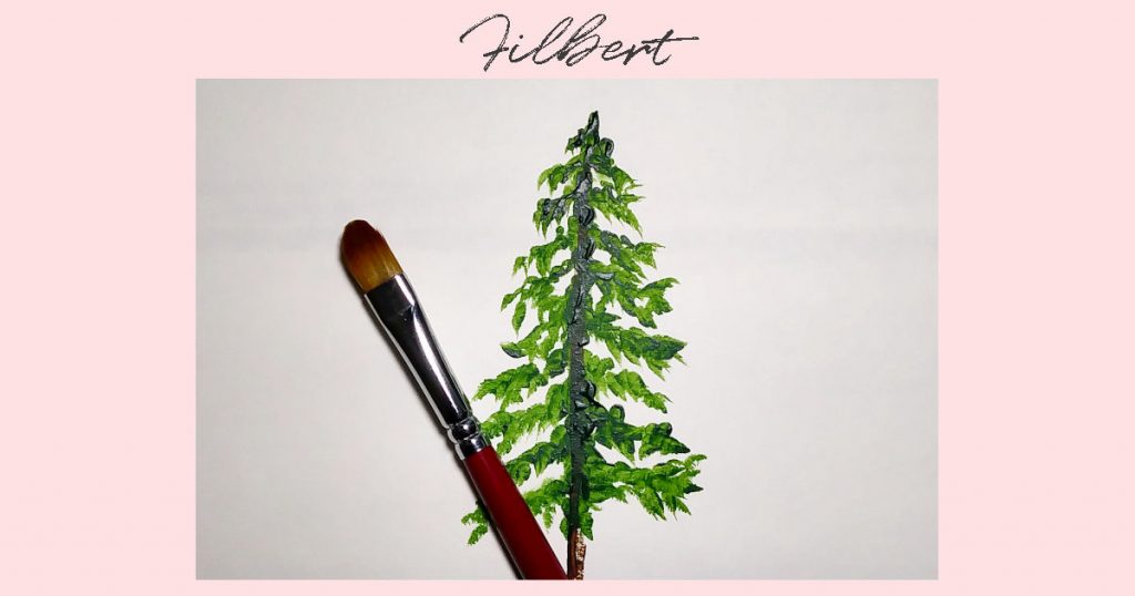 A pine tree painted on paper to show how to paint pine trees using a filbert paintbrush.