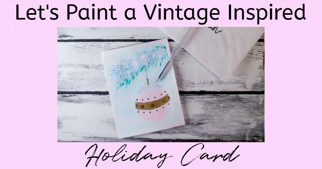 Our hand-painted holiday card, pen, and envelopes on a white wood background. Text overlay reads: Paint a Vintage Holiday Carl