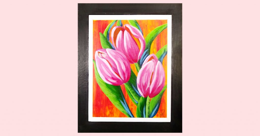 The pink tulip painting on black canvas after it's been varnished