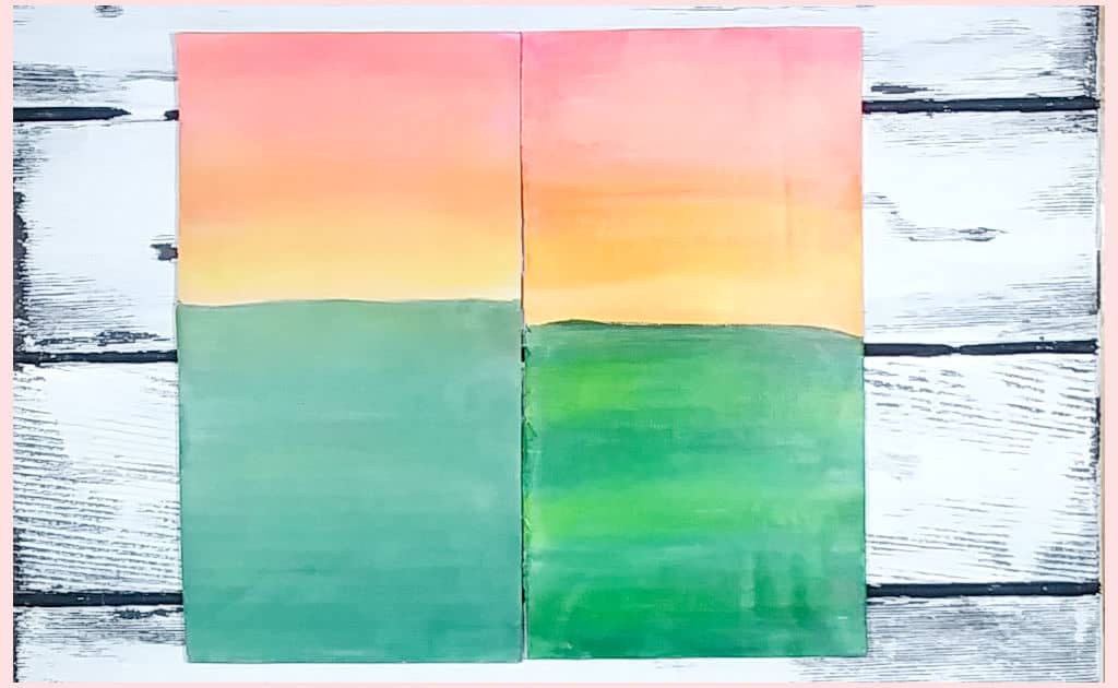 Side-by-side comparison of a sunset and green field painted on corrugated cardboard, one primed with gesso and one primed with white paint.