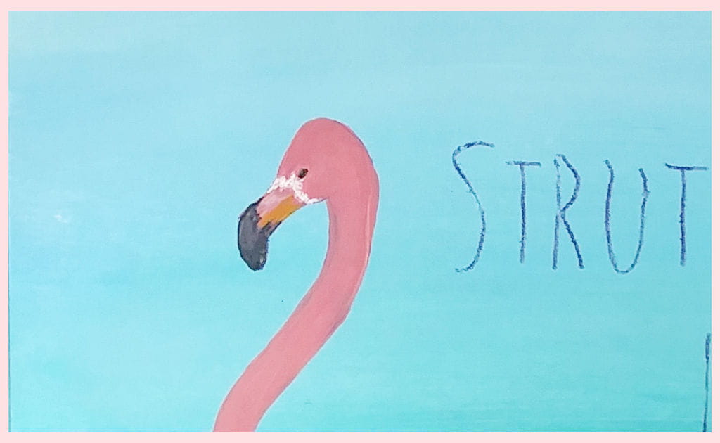Closeup showing the finished painting on the flamingo's beak and eye