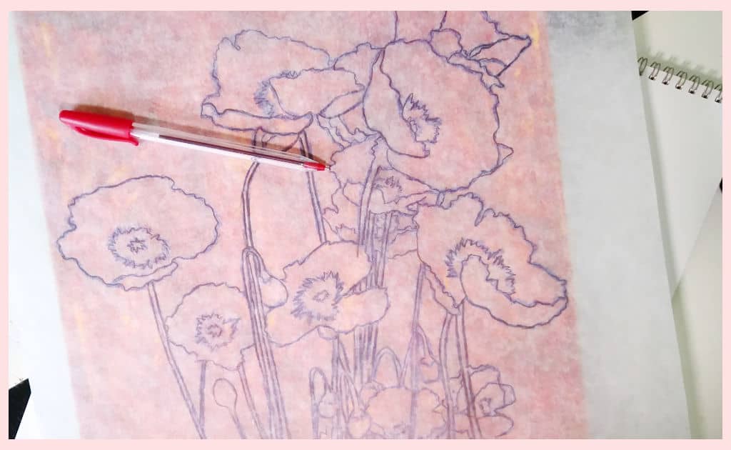 The parchment paper poppy traceable on top of a painted canvas with a red ballpoint pen