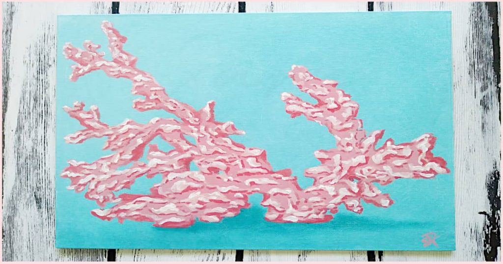 Finished painting tutorial of a piece of reef coral on a turquoise background using your favorite coral color made during the "how to mix coral acrylic paint" experiment.