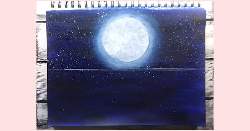 The next step in painting the moon is to start adding moon glow very gently and with very little paint.