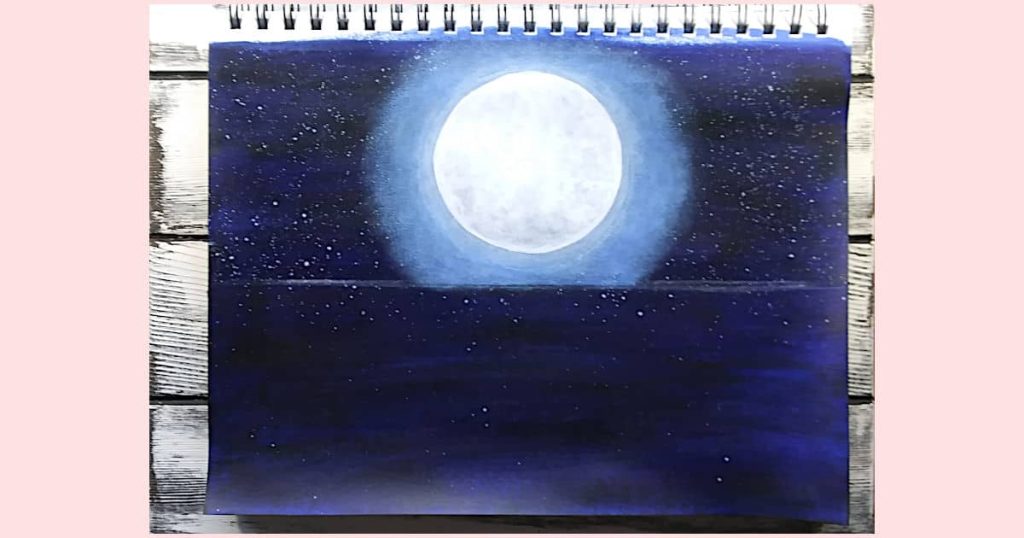The moon glow finished. Two layers were added using a scruffy angle brush, one layer was a lighter shade of the night sky and the other layer was smaller and white.