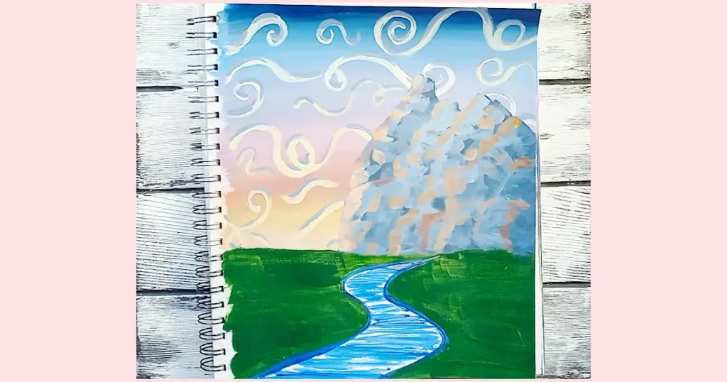 The mountain range with peach and pink added to the parts where the sunset would reflect off of it.