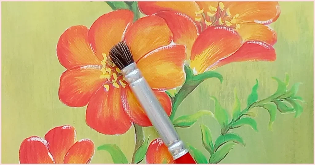 A deer foot stippler paint brush against a floral backdrop