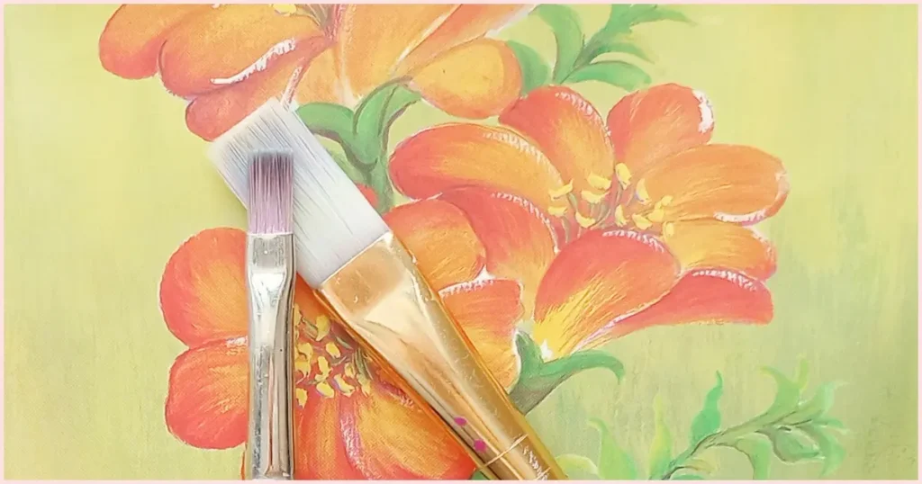 A comparison of the small flat detail brush with a larger version.
