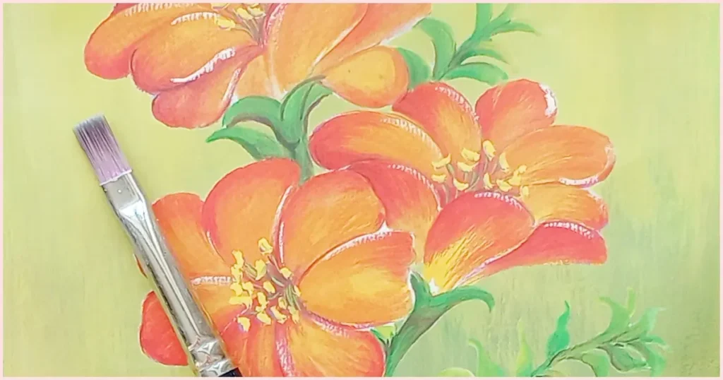 Very small flat detail brush laying on a floral background