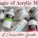 A variety of bottles, tubes, and jars of acrylic mediums with text that reads: "The Magic of Acrylic Mediums: A Complete Guide".